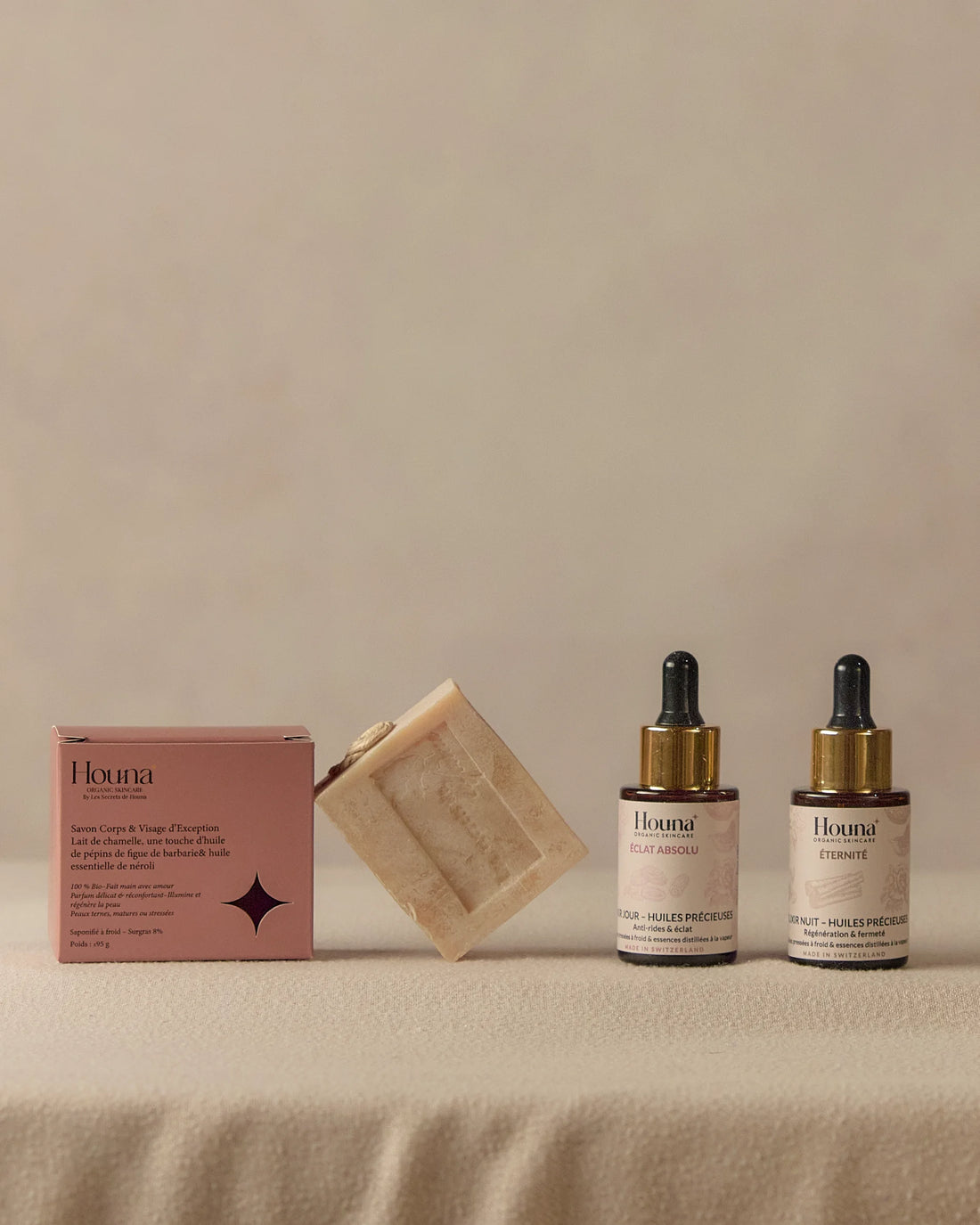 Routine visage Le Rituel Houna - sérum jour ÉCLAT ABSOLU, sérum nuit ÉTERNITÉ et savon artisanal saponifié à froid, soins naturels suisses pour peau éclatante